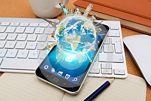 Modern mobile phone with digital world landmarks