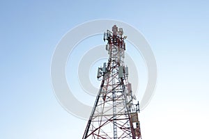 Modern mobile tower against the blue sky. Modern technologies. 5G.