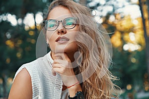 Modern model woman wearing eyewear, expresive lips