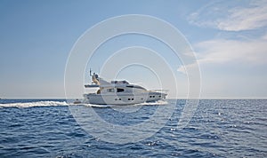 Modern motor-yacht cruising the sea