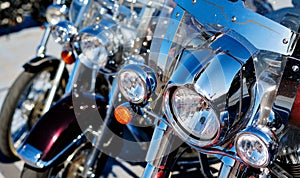 Modern motorcycle headlights close up view outdoors