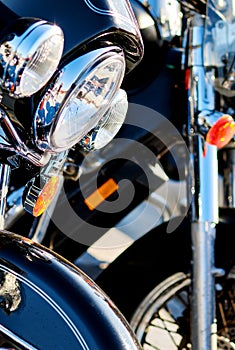 Modern motorcycle headlights close up view