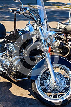 Modern motorcycle parked on city street