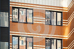 modern multi-family housing, residential building facade with aluminum windows