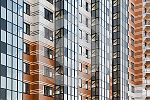 modern multi-family housing, residential building facade with aluminum windows