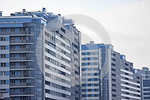 Modern multi-storey building, skyscraper. construction of a glass house. a large number of residential and commercial areas. Urban