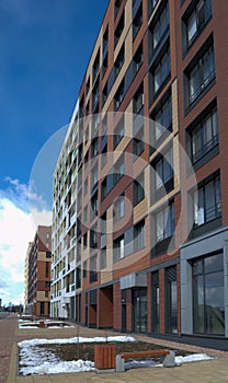 Modern Multi-Story Building with Colorful Exterior photo
