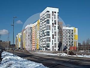Modern Multi-Story Building with Colorful Exterior photo