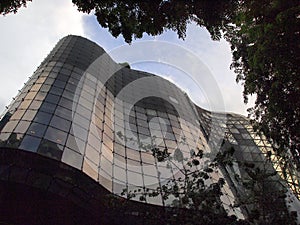 Modern Multi Story Building, Curved Glassed Facade photo