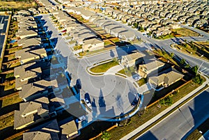 Modern Neighborhood Communities with Cul De Sac low angle evening golden hour photo