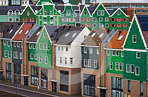 New neighbourhood in Zaandam, modern dutch houses with architecture typical for Zaan region photo