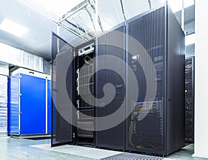 Modern network and telecommunication technology computer concept: server room in datacenter