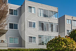 Modern and new apartment building. Multistoried modern, new living block of flats. Real estate condo architecture photo