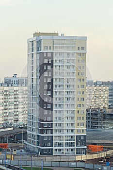 Modern and new apartment building. Multistoried modern, new and stylish living block of flats.