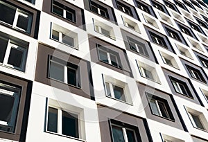 Modern and new apartment building. Photo of a tall block of flat