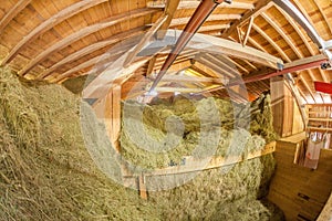 Modern new hayloft during haymaking