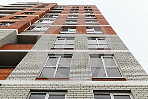 Modern new multi-storey brick building of `40 lodges`, Krasnooktyabrsky district city of Volgograd. A look with a bottom