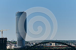 Modern New Skyscraper Blue Glass Building Top Tower Kula in Capital City. Belgrade Serbia. On sunny spring day. A road