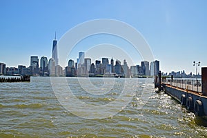 Modern New York City Viewed from Liberty State Park across Hudson River on a sunny day