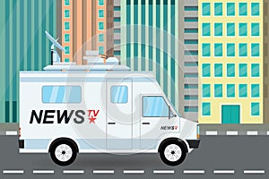 Modern news truck on city road, mobile broadcasting vehicle