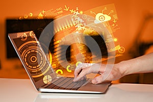 Modern notebook computer with future technology symbols