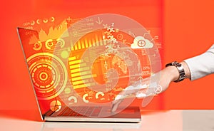 Modern notebook computer with future technology symbols