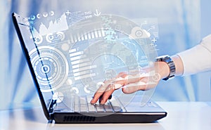 Modern notebook computer with future technology symbols