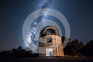 modern observatory, with state-of-the-art equipment and telescope, among the starry skies