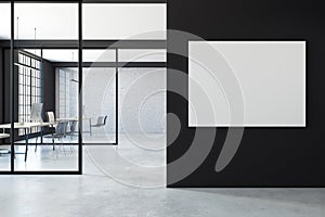 Modern office with blank poster