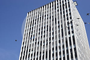 Modern office building against a blue sky, United States.