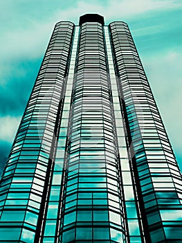 modern office building with blue sky clouds