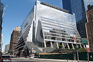 Modern office building at the corner of 10th Ave and W 31st Street by the Hudson Yards, New York, NY, USA