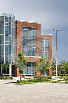 Modern office building and empty parking lot