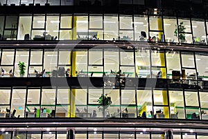 Modern office building with facade of glass.