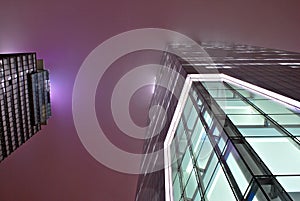 Modern office building with facade of glass.