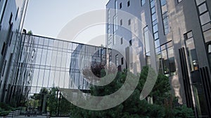 Modern office building facade in morning sunlight. Futuristic architecture.