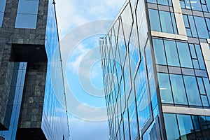 Modern office building glass facade. Architecture details.