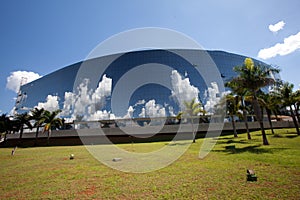 Modern office building with reflections in windows