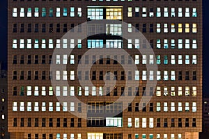 Modern office building at night close up