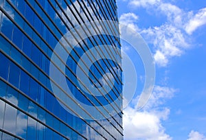 Modern office building and sky reflection