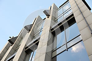 Modern office building with tinted windows on sunny