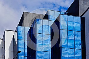 Modern Office Buildings, Blue Sky Reflected in Glass facades