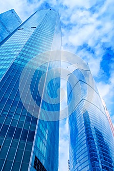 Modern office buildings. Low angle shot of modern glass skyscrapers against the sky, Moscow city, Russia.