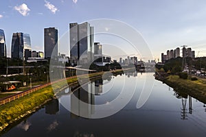 Modern office buildings and Pinheiros River in Sao Paulo city,