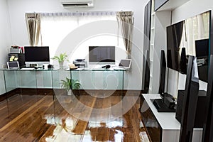Modern office with computer and labtop photo