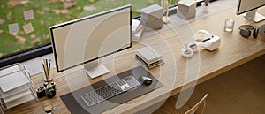 Modern office desk workspace with computer mockup, office supplies and decor on wood table