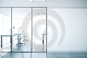Modern office interior with blank wall