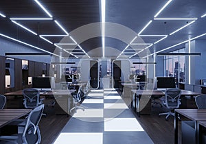Modern office interior featuring sleek workstations with ergonomic chairs and computer monitors.