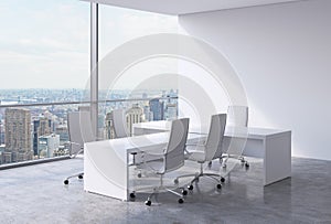 Modern office interior with huge windows and New York panoramic view. A concept of CEO workplace.