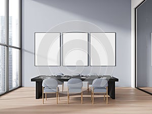 Modern office meeting room interior with desk and seats, mock up frames